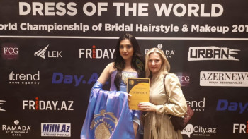 Фотография к новости: Платье казахстанского модельера восхитило жюри на конкурсе "Dress of the world" в Баку