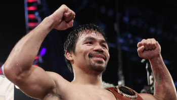 Фотография к новости:  Мэнни Пакьяо победил Эдриена Бронера и защитил титул чемпиона мира WBA