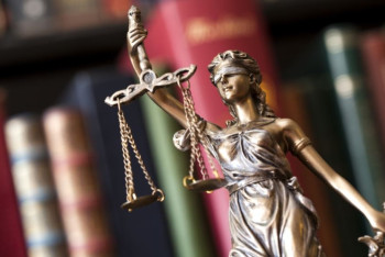 Фотография к новости: Экс-сотрудника Генпрокуратуры и следователя ДВД судят в Алматы