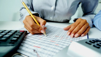 Фотография к новости: За взятку в 2 тыс тенге астанчанка заплатила штраф в 150 раз больше