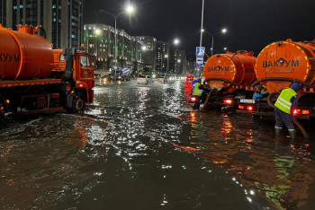 Фотография к новости: После дождя затопило улицу на левобережье Астаны