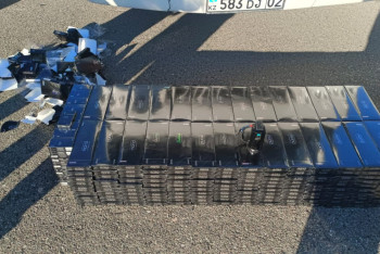 Фотография к новости: Тайник с сигаретами на миллион тенге нашли в кондиционере автобуса в Хоргосе