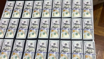 Фотография к новости: Фальшивые доллары сбывали в Казахстане члены транснациональной ОПГ