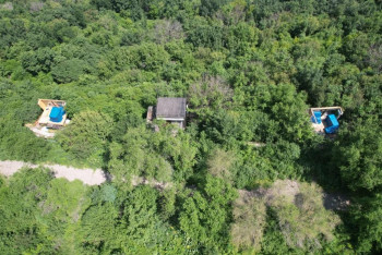 Фотография к новости: Три незаконных строения снесли в предгорьях Алматы