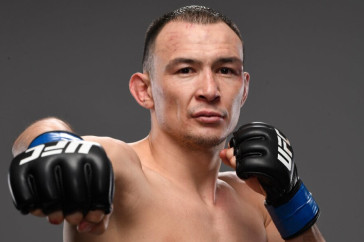 Фотография к новости: "Казах" пробил "вертушкой" и отправил в нокаут бразильца в бою за титул