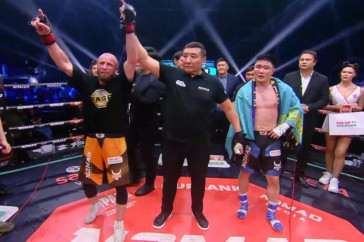 Фотография к новости: Кровавым избиением закончился бой "Казахского терминатора" за титул