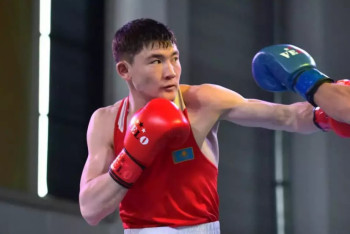 Фотография к новости: Работающий курьером боксер стал чемпионом Казахстана