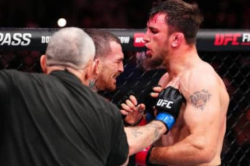 Фотография к новости: Казахстанский боец устроил потасовку с соперником после нокаута в UFC