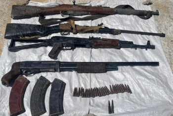 Фотография к новости: КНБ изъял десятки единиц оружия и сотни боеприпасов в 7 регионах страны