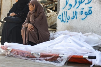 Фотография к новости: 99 палестинцев погибли в результате новых атак Израиля