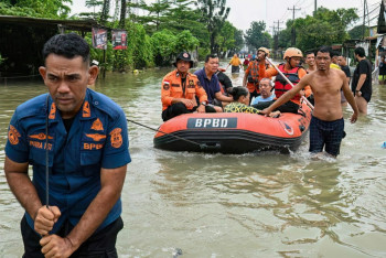 Фотография к новости: Число погибших из-за наводнений в Индонезии превысило 900 человек