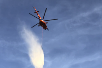 Фотография к новости: С вертолета тушат горящий склад в Алматы 