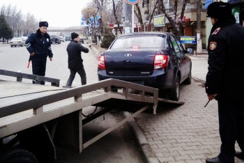 Фотография к новости: ОПМ в Астане: 69 машин отправлены на штрафстоянку