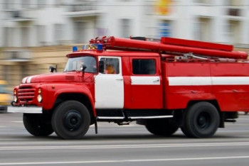 Фотография к новости: В центре Астаны горит "депутатский дом"