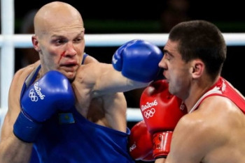 Фотография к новости: МОК пересмотрит бой Василия Левита против российского боксера