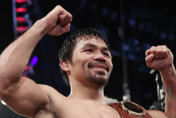 Фотография к новости:  Мэнни Пакьяо победил Эдриена Бронера и защитил титул чемпиона мира WBA