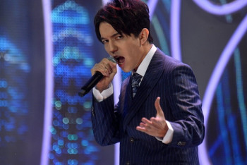 Фотография к новости: Димаш Кудайберген вошёл в список голосования за лучших певцов всех времён 