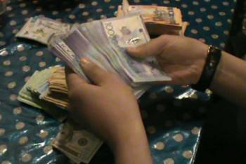 Фотография к новости: Крупную сумму для финансирования незаконных акций изъяли у членов ДВК в Алматы 