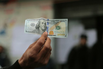 Фотография к новости: Доллар стал стоить дешевле 400 тенге