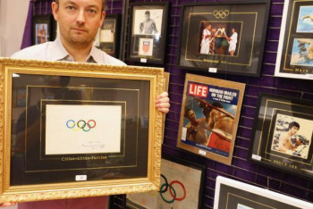 Фотография к новости: Оригинальный рисунок олимпийских колец продали с аукциона в Каннах за 185 тысяч евро