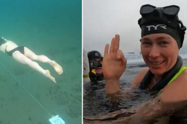 Фотография к новости: Женщина проплыла подо льдом Байкала без гидрокостюма и установила мировой рекорд