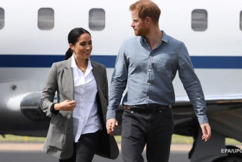 Фотография к новости: Гарри не может наладить отношения с королевской семьей из-за Меган