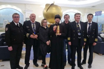 Фотография к новости: Благодатный огонь из Иерусалима доставили в Казахстан