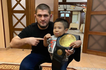 Фотография к новости: Ребенок-боец Амир Байгазин встретился с Хабибом Нурмагомедовым в Алматы