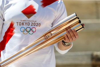 Фотография к новости: Эстафета олимпийского огня завершилась в Токио