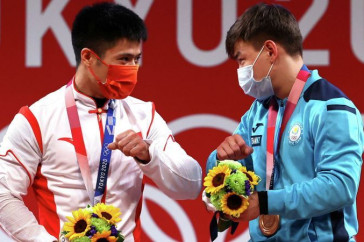 Фотография к новости: Олимпийцам Токио-2020 разрешили снимать маску на несколько секунд