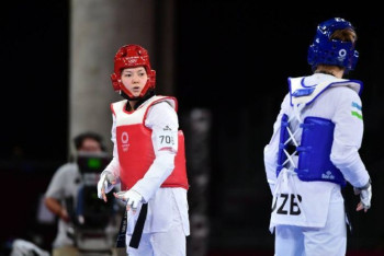 Фотография к новости: Казахстанская таэквондистка стартовала с победы на ОИ в Токио