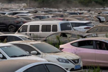 Фотография к новости: В Китае появились стоянки для сушки авто, пострадавших при наводнении