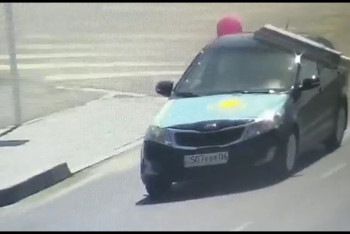 Фотография к новости: Штраф выписали водителю за прикрепленный к авто флаг Казахстана