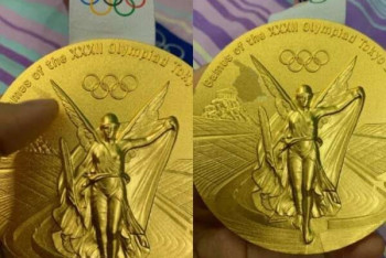 Фотография к новости: Китайские спортсмены недовольны качеством золотых медалей Олимпиады в Токио