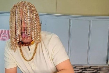 Фотография к новости: Мексиканский рэпер заменил натуральные волосы на золотые цепи