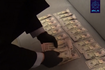 Фотография к новости: Сбыт фальшивых долларов пресекли в Нур-Султане