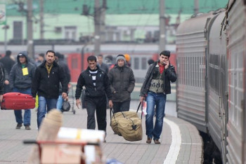 Фотография к новости: Россия вносит ограничения в правила фотографирования мигрантов