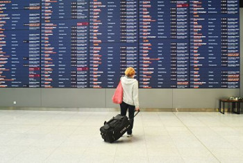 Фотография к новости: Более 5000 авиарейсов по всему миру отменили в дни праздников из-за омикрона