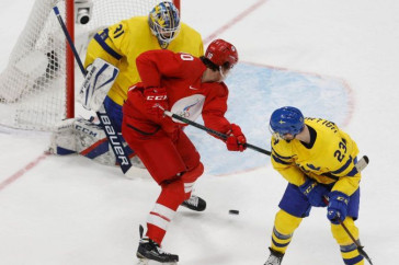 Фотография к новости: Странный обряд российской сборной по хоккею заметили на ОИ в Пекине