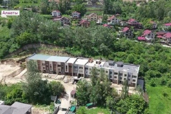 Фотография к новости: Cтроительство таунхауса угрожает оползнем коттеджному городку в Алматы