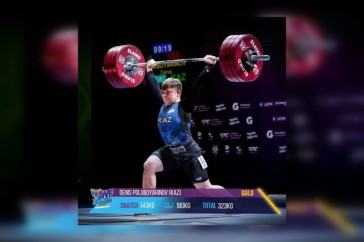 Фотография к новости: Казахстанский тяжелоатлет завоевал золото на чемпионате мире