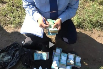 Фотография к новости: Похищенные у инкассаторов 14 миллионов тенге нашли на берегу реки