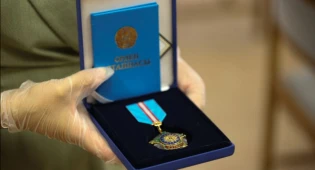 Президент наградил ряд казахстанцев, учувствовавших в строительстве домов в Аулиекольском районе