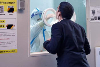 Фотография к новости: В КНР зафиксировали новый рекорд заболеваемости COVID-19 за сутки