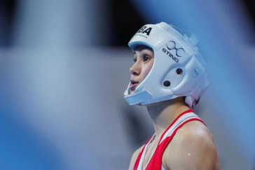 Фотография к новости: Алуа Балкибекова побывала в нокдауне и стала чемпионкой мира в Индии