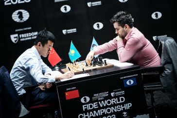 Фотография к новости: Рубились до голых королей: в Астане разыграли десятую партию за шахматную корону мира