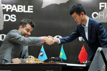 Фотография к новости: Последняя партия в борьбе за шахматную корону мира завершилась ничьей