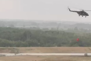 Фотография к новости: 11 вертолётов сбросили более 400 тонн воды в очаги лесного пожара в области Абай