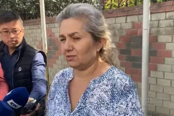 Фотография к новости: Жена алматинского стрелка Игоря Дужнова  угрожает самосожжением