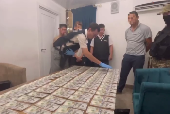 Фотография к новости: В Шымкенте преступная группа продавала фальшивые деньги и наркотики